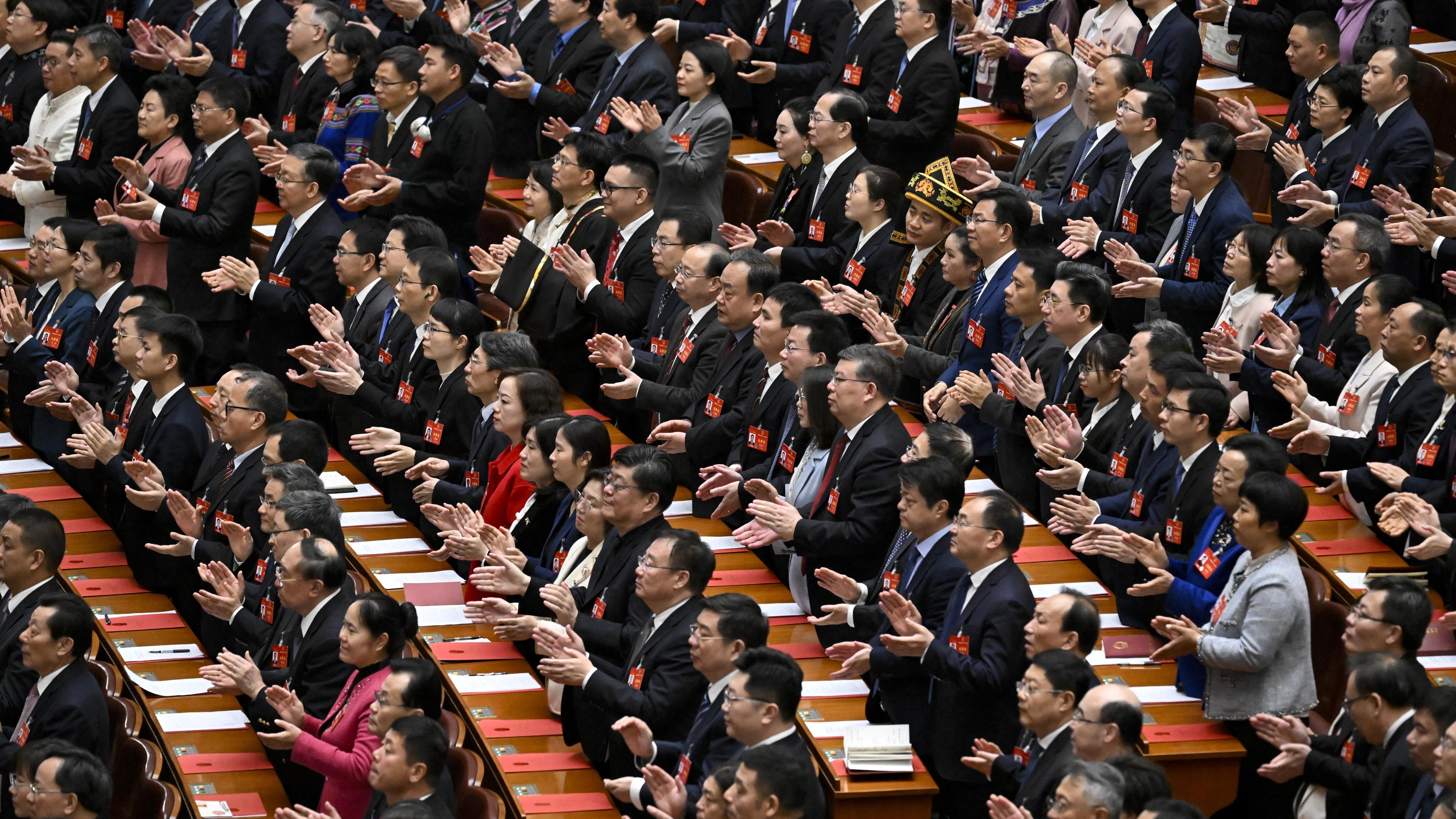 Delegater vid Nationella folkkongressen i Peking den 11 mars. Folkkongressen är en av de två församlingar som utgör Kinas ”parlament”. Foto: Wang Zhao/AFP via Getty Images