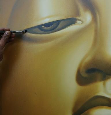 Måleri av en Buddha. Konstnär Sarath Yatawara. (Foto: AFP/Ishara S. Kodikara)