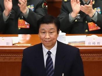 Kinas nyligen utsedde vice ordförande, Li Yuanchao, i Folkets stora sal, den 14 mars i Peking. Utnämningen av Li ses som ett tecken på att den nye partiledaren Xi Jinping samlar makten runt sig själv och minskar inflytandet från Jiang Zemins partifraktion. (Feng Li/Getty Images)