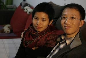 Bild tagen då Jinyan Zeng och Hu Jia sattes i husarrest i mars 2007. (Foto: Getty Images) 
