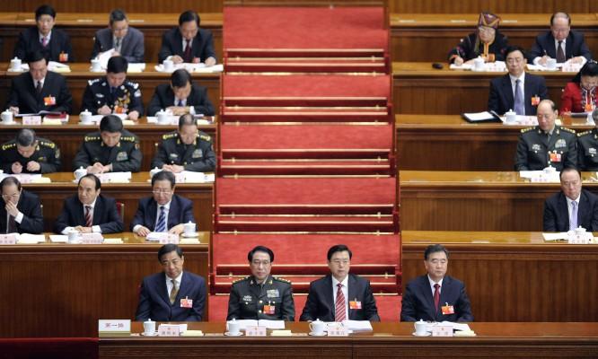Bilden är tagen vid öppnandet av den Nationella folkkongressen (NFK) i Peking i Folkets stora sal, den 5 mars och visar (längst fram från vä till hö) Bo Xilai, kommunistpartiets sekreterare i Chongqing, Xu Caihou, vice ordförande i den centrala militärkommissionen, Zhang Dejiang, Kinas vice premiärminister och Wang Yang, kommunistiska partiets sekreterare för Guangdong. Bo Xilai har nyligen ersatts av vice premiärminister Zhang Dejiang, enligt ett kort uttalande i Xinhua den 15 mars. (Foto: Liu Jin/AFP)