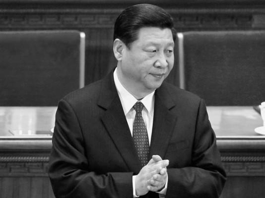 Xi Jinping, som väntas bli den nye ledaren för kommunistpartiet, i Folkets stora sal i Peking, 13 mars. (Lintao Zhang/Getty Images)