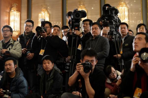Kinesiska journalister på jobb i Peking. (Foto: Mark Ralston /AFP/Getty Images) 