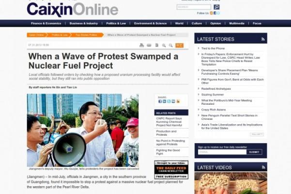 Artikeln i Caixin visar Wu Guojie, ställföreträdande borgmästare i Jiangmen. Han berättar för aktivister att planerna på att bygga en kärnbränsleanläggning har lagts ner. Protesterna mot kärnbränsleanläggningen tvingade tjänstemän att stoppa det, vilket är ett ovanligt fenomen i Kina. (Skärmdump/Epoch Times)  