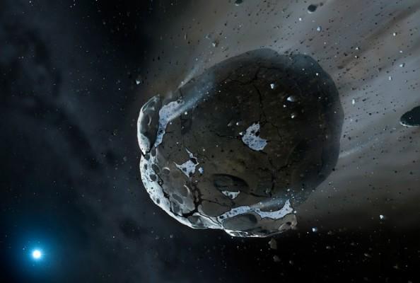 En konstnärs bild av en asteroid innehållande vatten på väg mot en vit dvärgstjärna. (ESA/Hubble, CC BY)
