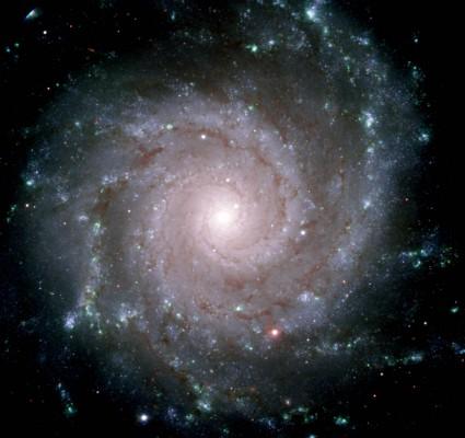 Ända sedan Demokritos lade fram hypotesen om atomens existens och ”odelbara partiklar” för över två tusen år sedan har människan utforskat och grubblat över universums grundläggande grundstenar. På bilden syns galaxen NGC 628 som finns i stjärnbilden fiskarna. (Foto: AFP/Geminiobservatoriet)