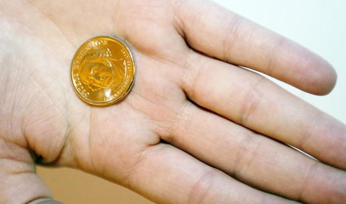 Det nya myntet med bild av president George Washington. (Foto: AFP/Don Emmert)
