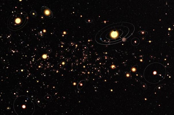 Teckningen ger ett intryck av hur vanligt det är med planeter runt stjärnor i Vintergatan. (ESO/M. Kornmesser)