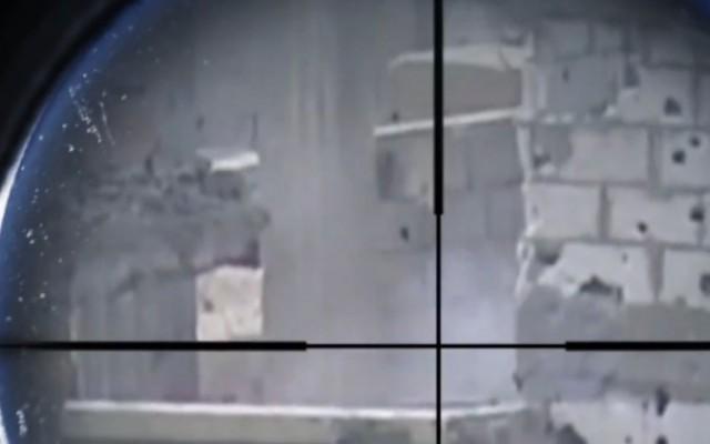 (Foto: Skärmdump från IS, video som är tagen bakom en krypskytt)
