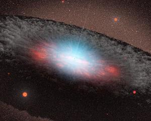 En konstnärlig illustration av det superstora svarta hålet i centrum av galaxen, och utsändning av "dödsstrålen". (NASA/JPL-Caltech)