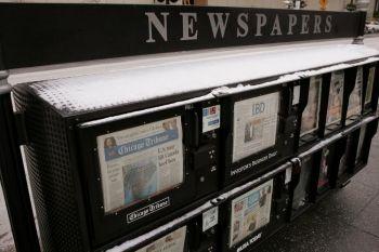 USA:s största tidningar misslyckas med annonsförsäljningen och upplagorna minskar. (Foto: Scott Olson/Getty Images)