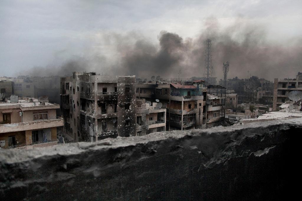 
Rök över en stadsdel i Aleppo 2012. (Foto: Manu Brabo /AP/TT-arkivbild)