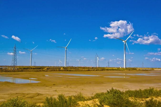 Vindkraftverk i utkanten av Dongying. Kina har ambitiösa vindkraftsmål, men är inte bra på att utnyttja kapaciteten. (Foto: AFP/Getty Images)
