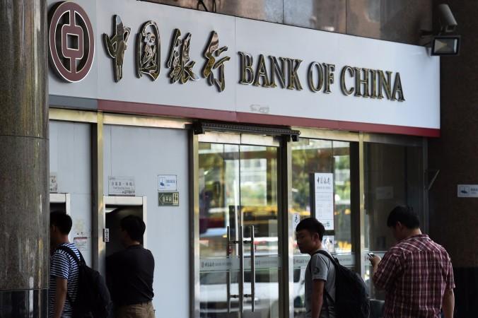 Bank of China är en av bankerna som ger ut nya värdepapper där dåliga lån ompaketeras ihop med andra tillgångar. (Foto: Greg Baker/AFP/Getty Images)