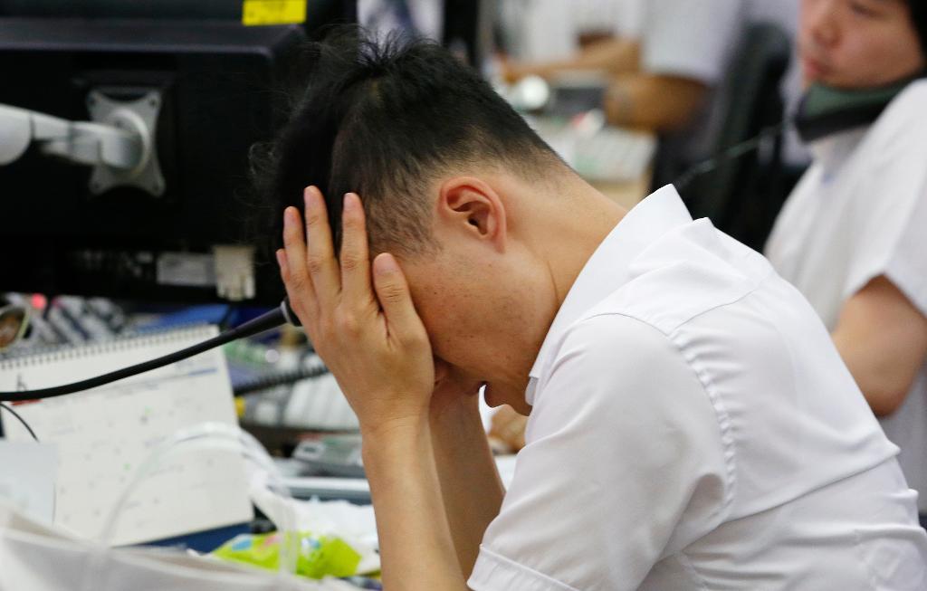 Valutahandlare världen runt hade i fredags en extremt hetsig dag på jobbet. (Foto: Lee Jin-man AP/TT-arkivbild)