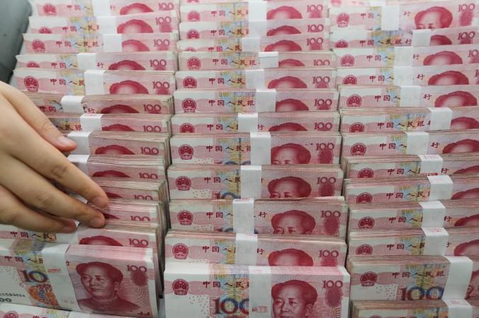 Kapitalutflöden ut ur Kina under juli  var netto 39 miljarder dollar. (STR/AFP/Getty Image)