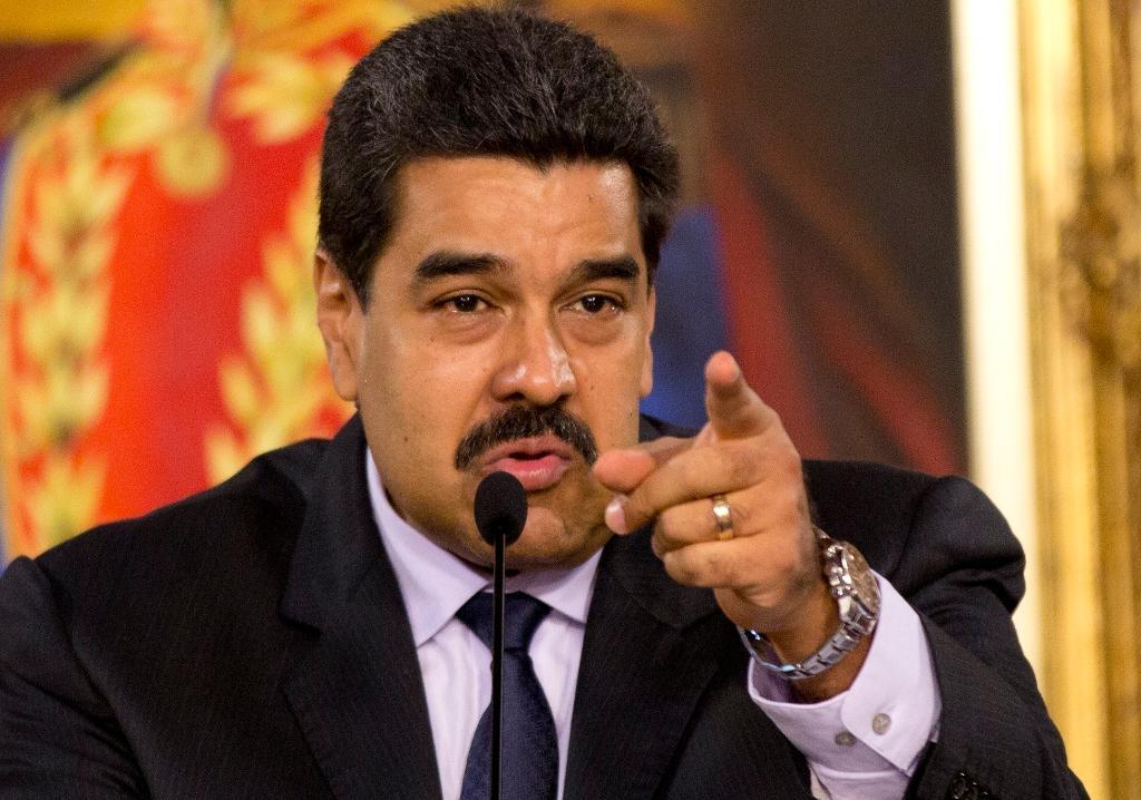 Venezuelas president Nicolas Maduro säger att petningen av Dilma Rousseff är en statskupp. (Foto: Ariana Cubillos /arkivbild)
