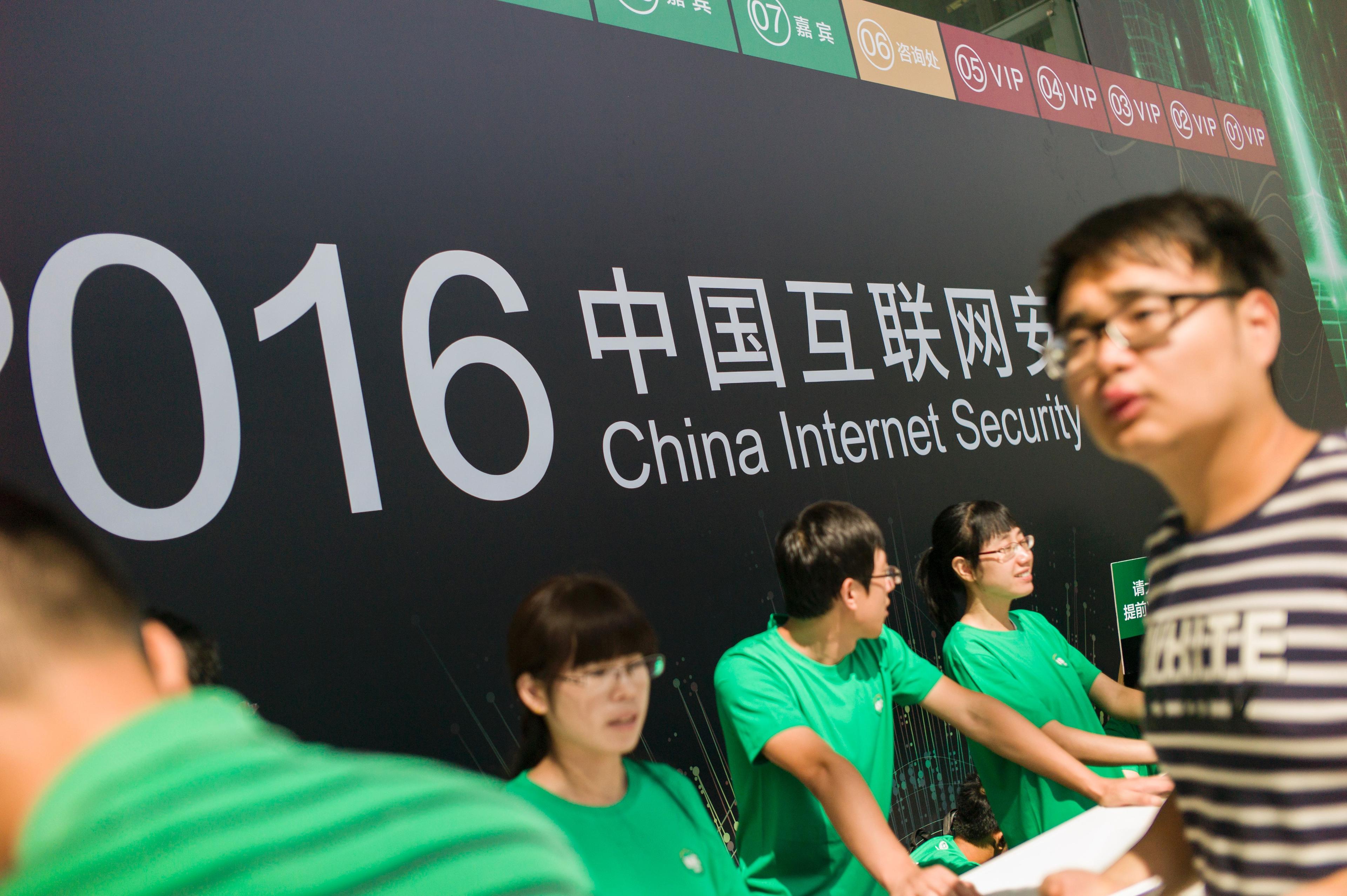 Kinesiska volontärer vid China Internet Scurity Conference i Peking.(Foto: Fred Dufour/AFP/Getty Images)