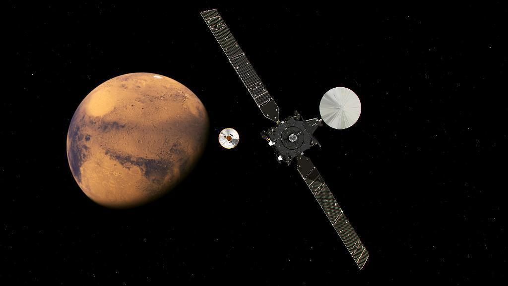 Den konstruerade bilden från ESA föreställer hur Mars-landaren Schiaparelli lämnar den sond som ska lägga sig i omloppsbana runt Mars. Klockan 16.42, svensk tid, försöker den europeiska rymdorganisationen ESA landa på Mars. (Foto: ESA/AP/TT)