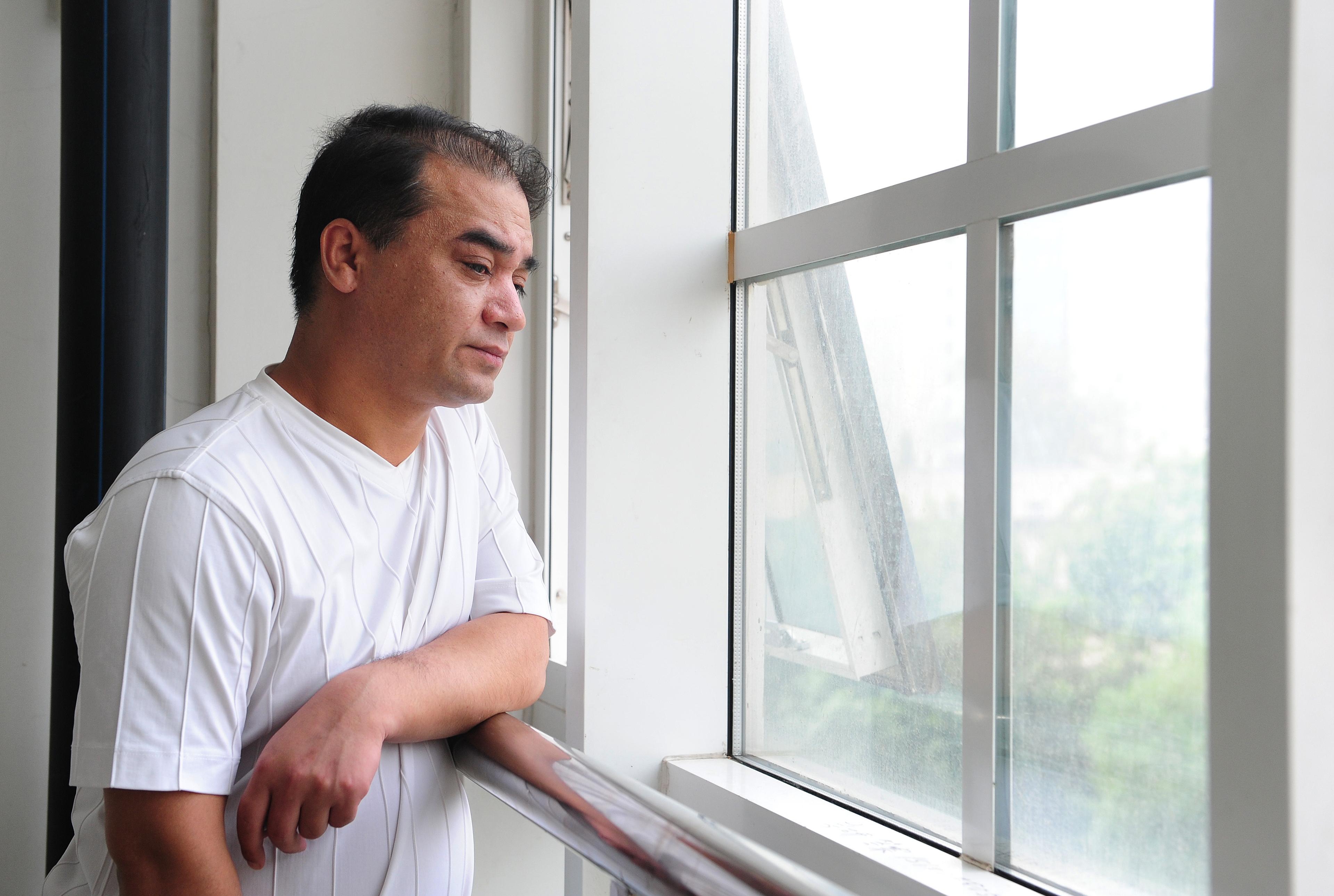 Ilham Tohti,  en framstående uigurisk intellektuell, som sitter fängslad på livstid i Kina, har vunnit det prestigefyllda Martin Ennals-priset för sin kamp för mänskliga rättigheter. (Foto: Frederic J. Brown/AFP/Getty Images)