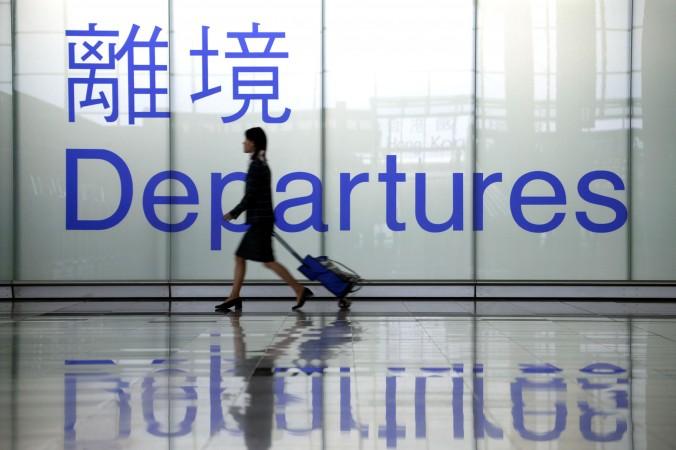Avgång är ett giltigt begrepp även för kinesiskt kapital. Bilden från flygplatsen Chek Lap Kok i Hongkong. (Foto: Christian Keenan/Getty Images)