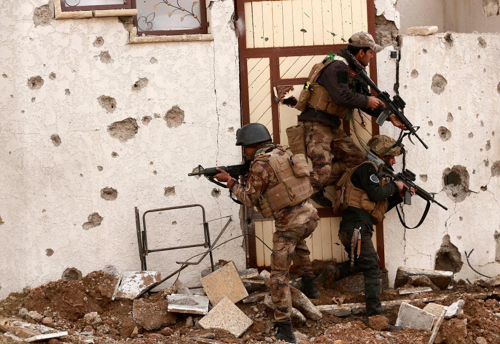 Irakiska specialstyrkor i östra Mosul. (Foto: Hadi Mizban/AP/TT-arkivbild)