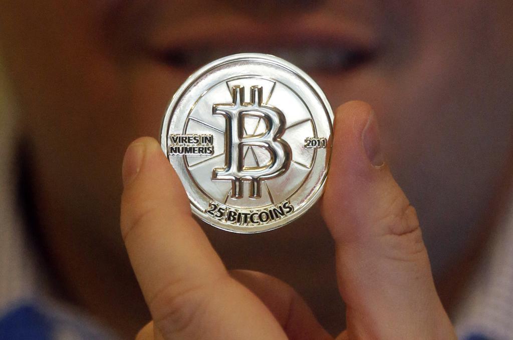 
En bitcoin är värd över 1 000 dollar för första gången på tre år. (Foto: Rick Bowmer/AP/TT-arkivbild)