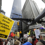 En låtsas militärplan togs med på en marsch under "Occupy Wall Street" protest nära Wall Street i New York den 15 oktober.