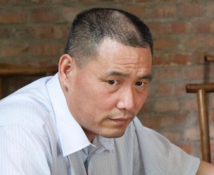 Människorättsadvoakten Pu Zhiqiang riskerar åtta års fängelse. (Foto: Andy Wong/AP/TT)