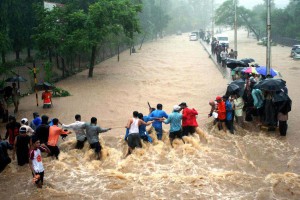 De kraftiga monsunregnen är bara en av många utmaningar som svenska företag möter i Indien. (Foto: AP/TT)
