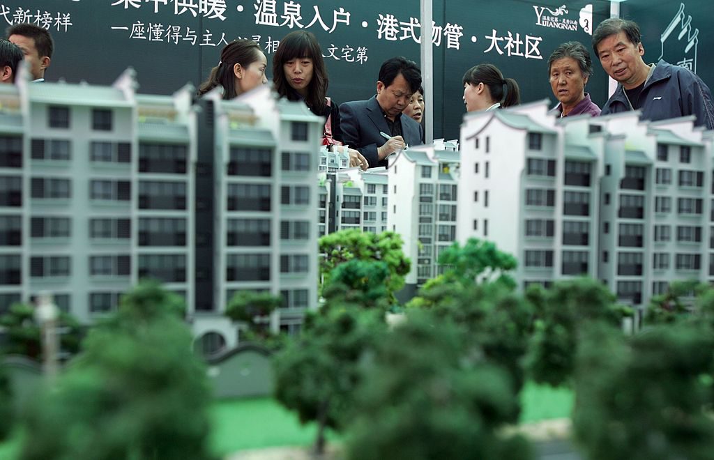 Fortune 500-listan visar tydligt den kinesiska ekonomins beroende av fastighetsbranschen. (Foto: China Photos/Getty Images)