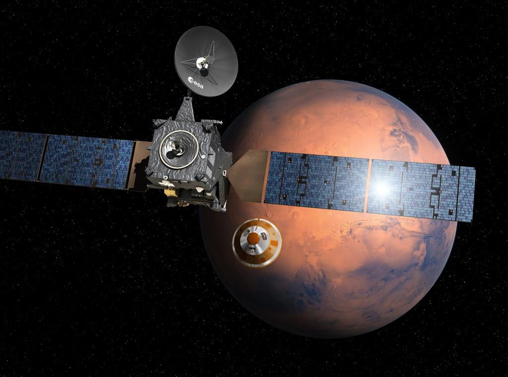 Schiaparelli lämnar den sond som skall lägga sig i omloppsbana kring Mars i ett försök att försöka att landa på planeten. Bilden är skapad av den europeiska rymdorganisationen ESA. (Foto: ESA/AP/TT)