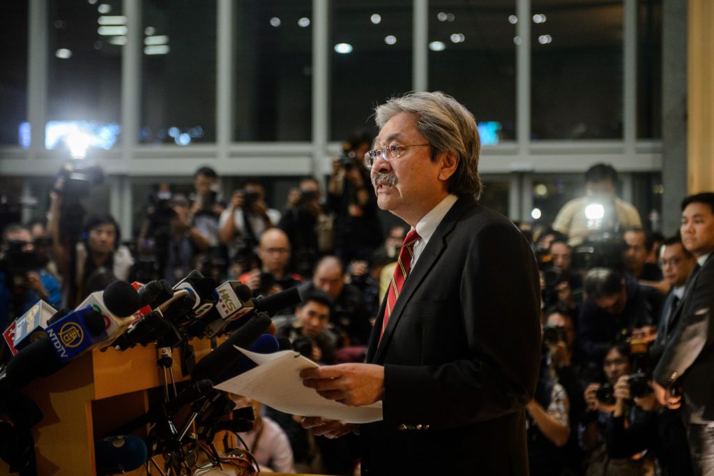 Hong Kong financial secretary John Tsang speaks at a press conference to announce his resignation in Hong Kong on December 12, 2016. Tsang -- nicknamed "Mr Pringles" by local media for his resemblance to the crisp brand's mascot -- is seen as a more moderate alternative to current leader Leung Chun-ying, who said he would step down in July. / AFP / ANTHONY WALLACE (Photo credit should read ANTHONY WALLACE/AFP/Getty Images)