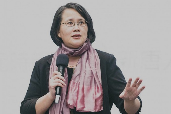 Guo Jun, Epoch Times chef i Hongkong, ger ett tal vid en konferens i Taiwan i november 2014. Hon säger att Epoch Times, som oberoende media med integritet och ärlighet i sin rapportering, är det enda fönstret in i det verkliga Kina. Foto: Chen Bo-Chou/Epoch Times