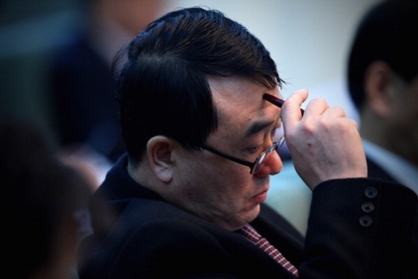 Wang Lijun, chefen för storstaden Chongqings allmänna säkerhetsbyrå, vid ett möte under den nationella folkkongressen i Folkets stora sal, 6 mars 2011 i Peking. (Foto: Feng Li/Getty Images)