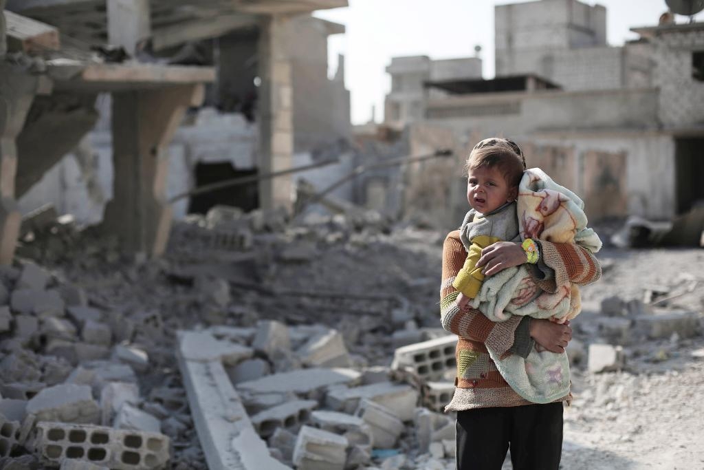 En av fyra skolor i Syrien är förstörda, sönderbombade eller ockuperade. Hälften av sjukhusen fungerar bara delvis eller är helt stängda. (Foto: AFP)