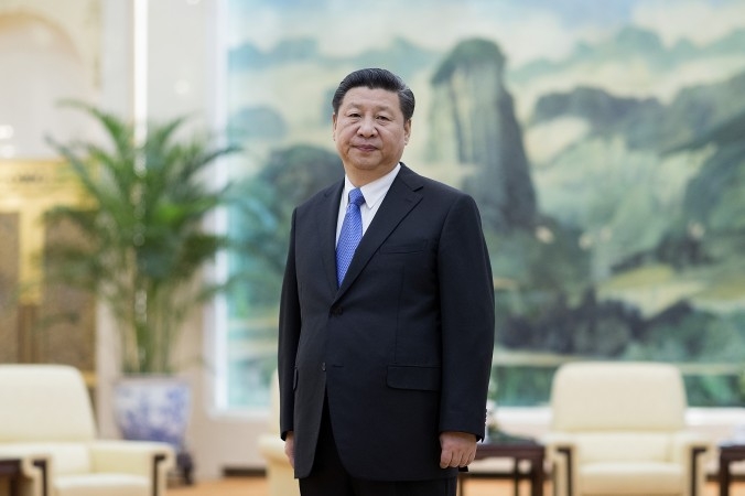 Kinesiska kommunistpartiets ledare Xi Jinping i Folkets stora sal i Peking, 25 mars 2016. Xis agerande på senare tid antyder att regimen kanske håller på att förändra sin inställning till falungong. (Foto: Lintao Zhang/AFP/Getty Images)