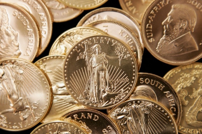 Guldmynten amerikansk Eagle och sydafrikansk Krugerrand tilldrar sig intresse. Blir det en återgång till guldstandard? (Foto: Scott Olson/Getty Images)