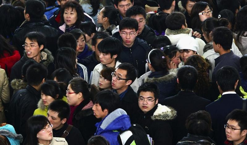 
Nyutexaminerade studenter samlas på en jobbmässa i staden Changchun i Jilinprovinsen i Kina, den 22 november 2008. Foto: China Photos/Getty Images                                            