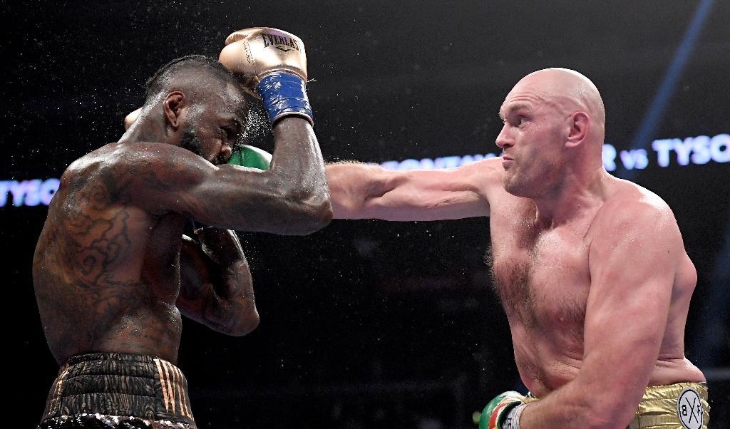


Tyson Fury får in en högerkrok mot Deontay Wilder i en match 2018. Fury kommer göra comeback mot Anthony Joshua i december, enligt Joshuas team. Foto: Harry How/Getty Images                                                                                                                                    