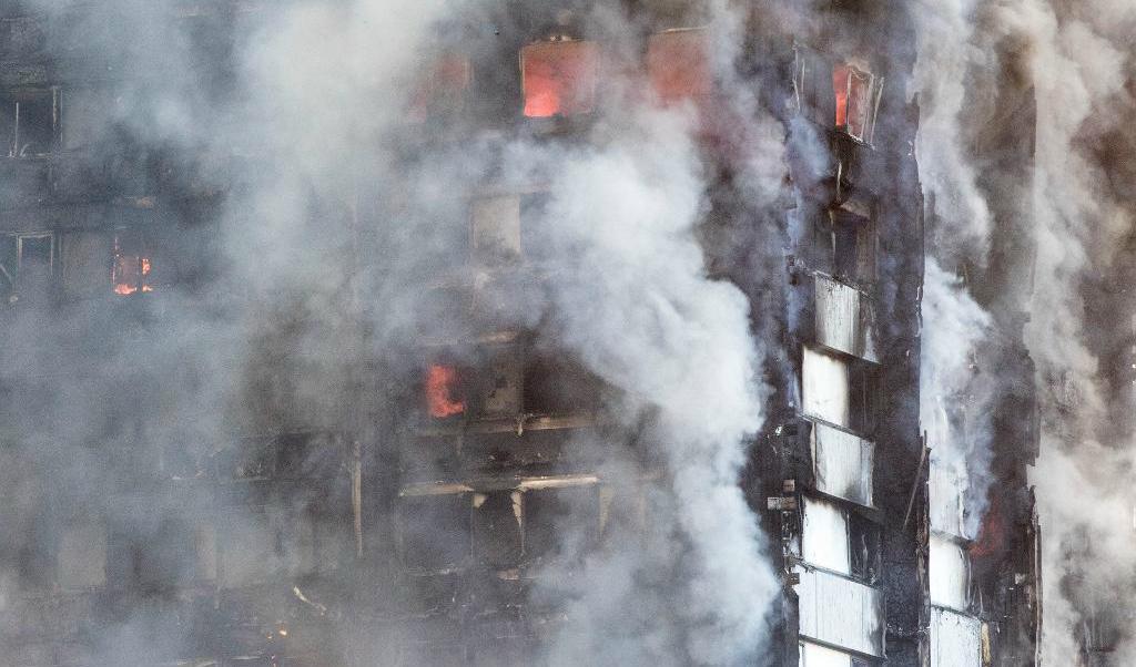 
Fler än 200 personer uppges bo i huset, som har 120 lägenheter. Foto: Rick Findler/AP/TT                                            