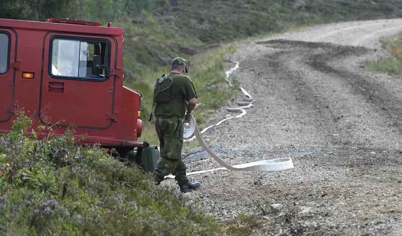 Personal från hela landet deltar i släckningsarbetet. Här en bild från Trängslet i Dalarna tidigare i veckan. Foto: Nisse Schmidt/TT