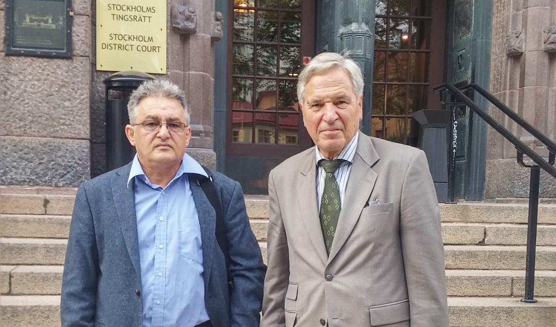 

Arkivbild på George Karimi och advokat Lars Carlén utanför Stockholms tingsrätt 31 augusti 2017, efter tingsrättens dom.  
Foto: Cecilia Samuelsson                                                                                                