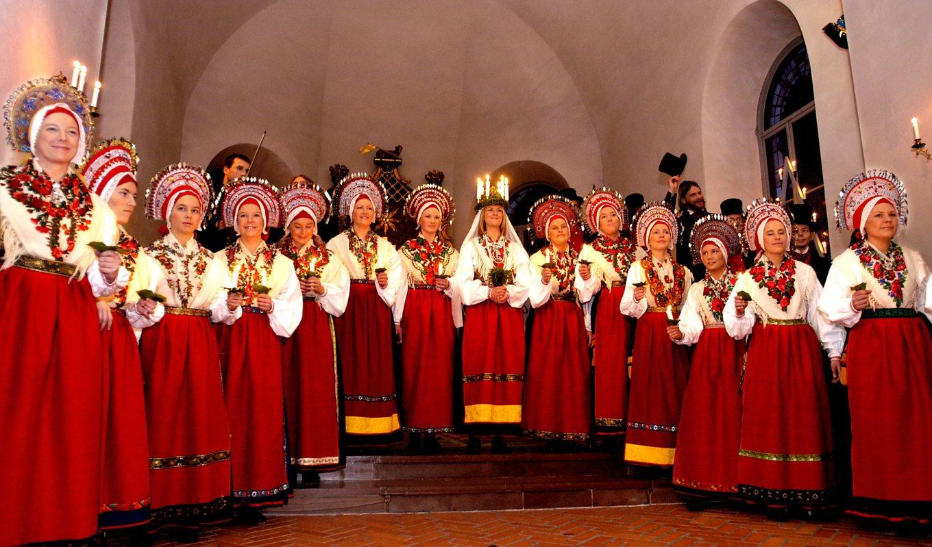 2004 syntes ett folkdräktsklätt Luciatåg från Malung i tv. Firandet återkommer lokalt från år till år och bygger på traditioner från 1860-talet. Foto: Jurek Holzer/SVD/TT