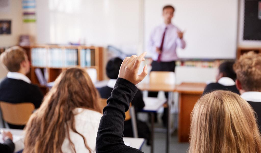 En av elevcoachens många roller är att överbygga glappet i förtroendet mellan elever och lärare och motivera eleverna att nå sina studiemål. Foto: Shutterstock