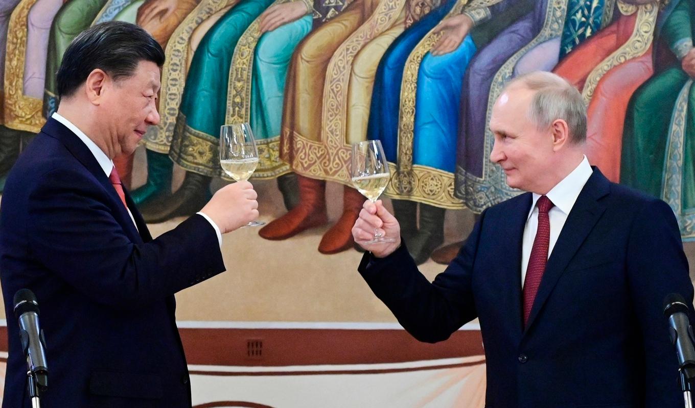 Xi Jinping och Vladimir Putin firar in det nya året med vänliga ord om ländernas stärkta relationer. Arkivbild. Foto: Pavel Byrkin/AP/TT