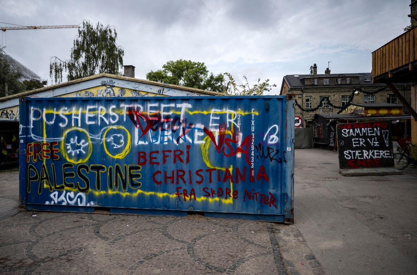 En nerklottrad container vid ingången till Pusher Street i fristaden Christiania i Köpenhamn i september 2023. Arkivbild. Foto: Johan Nilsson/TT