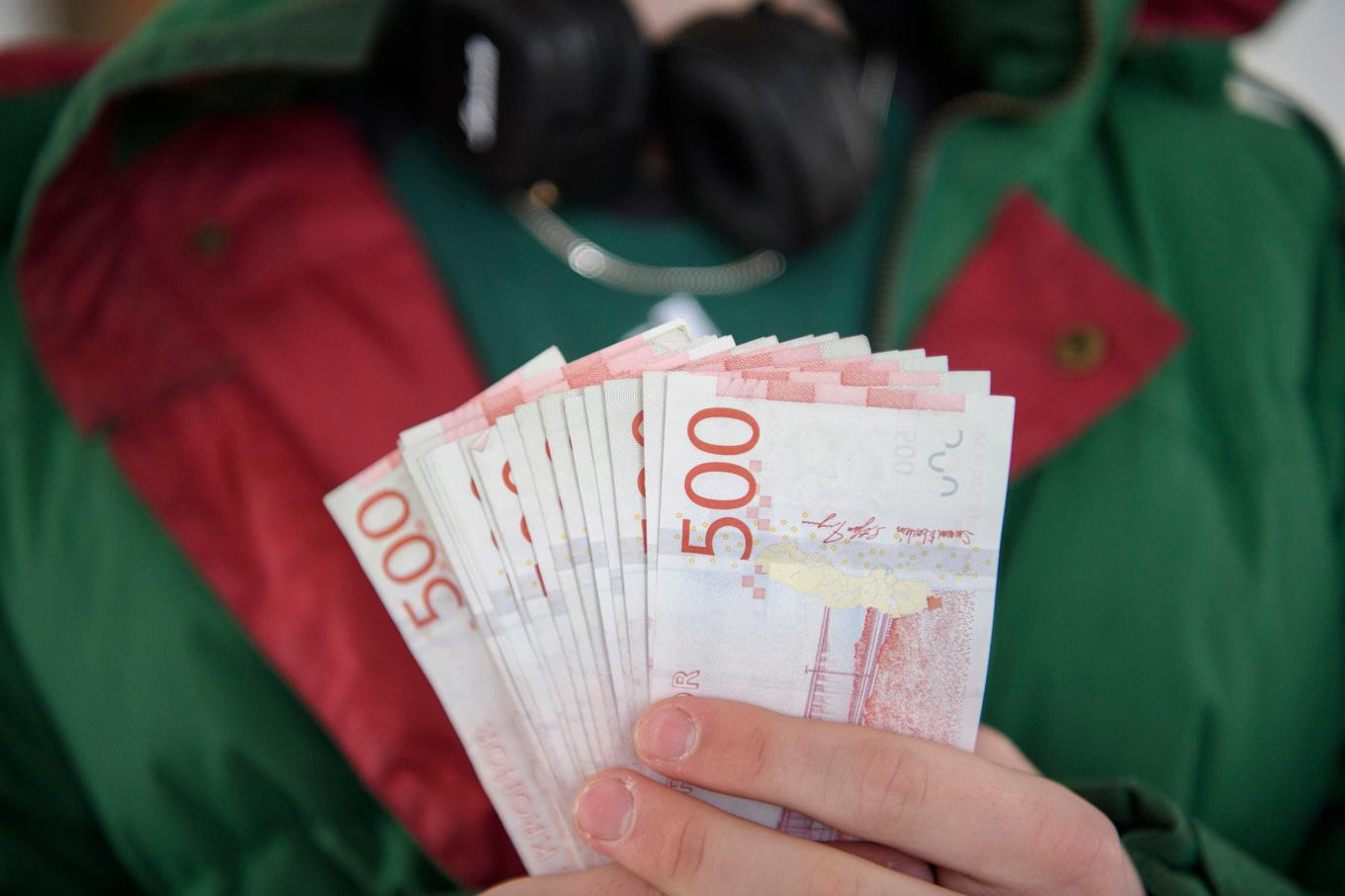 Anställda inom finans och rättsväsende hjälper kriminella att tvätta pengar, enligt Finanspolisen. Arkivbild. Foto: Henrik Montgomery/TT