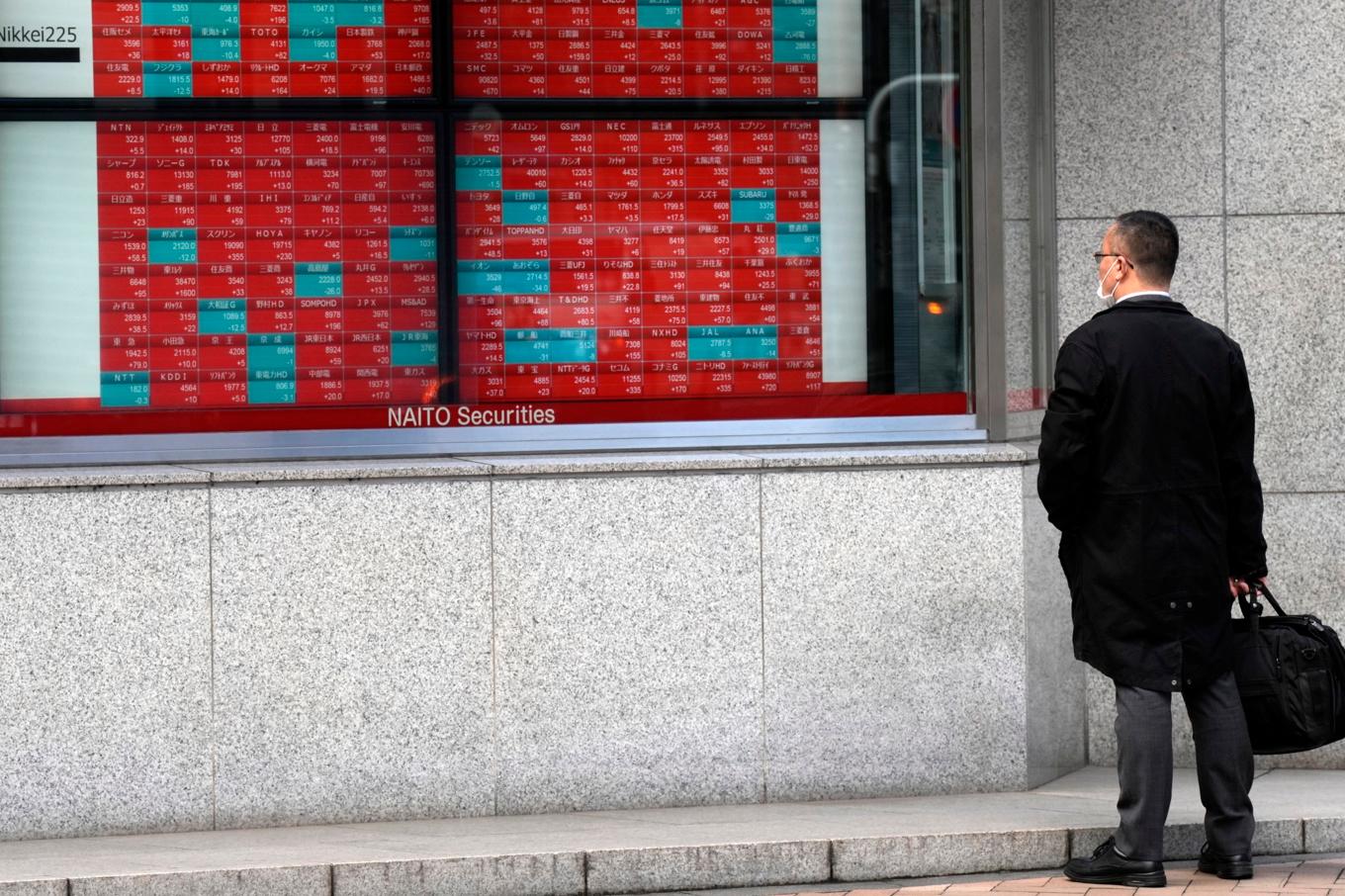 Den starka avslutningen på Wall Street i fredags, där starka jobbsiffror tolkades positivt, kan delvis förklara uppgången på Tokyobörsen. Arkivbild. Foto: Eugene Hoshiko/AP/TT