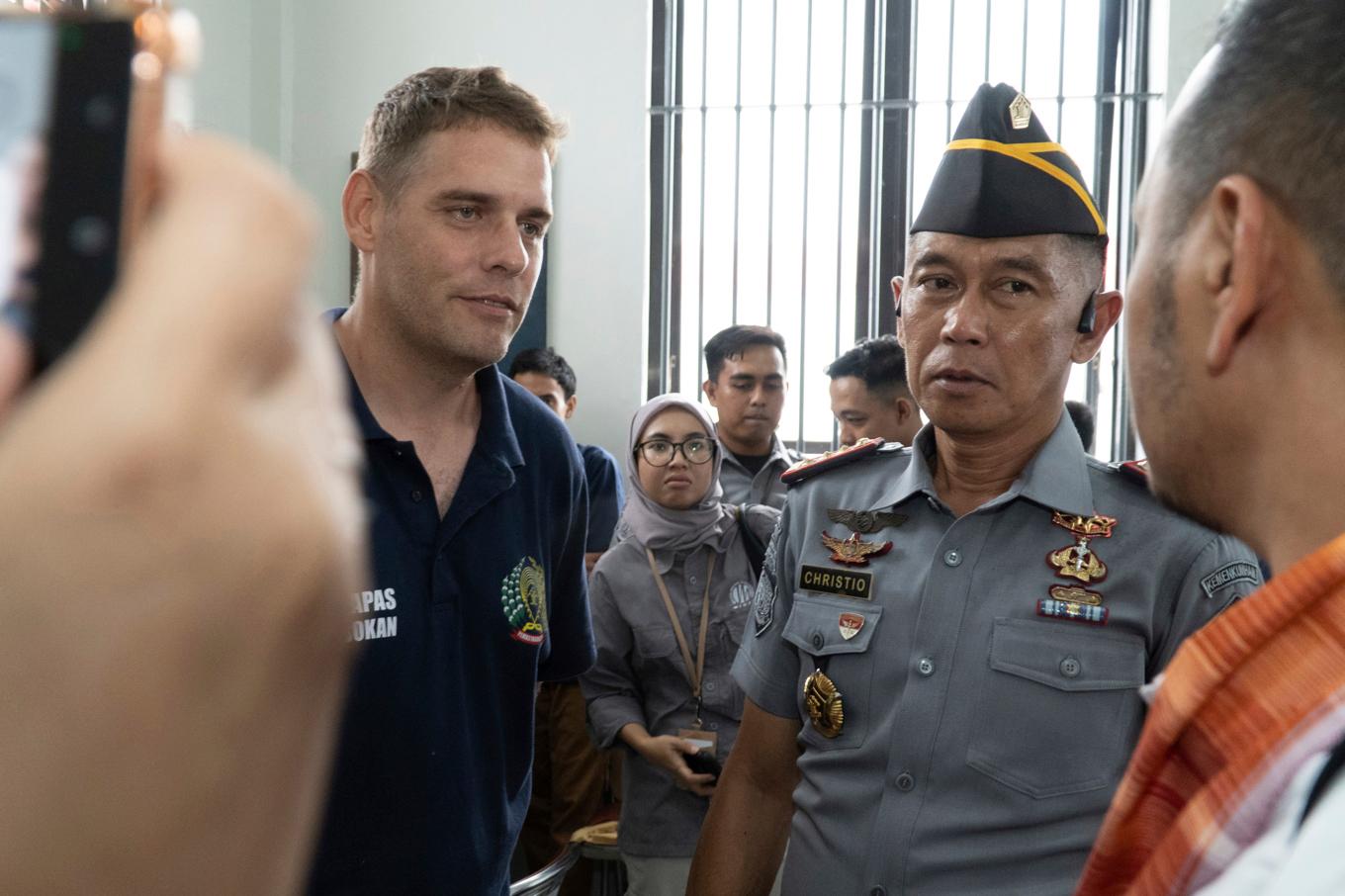 De "nio från Bali" dömdes till livstid för narkotikasmuggling i Indonesien för 20 år sedan och nu har de fem som återstår, en av dem Matthew Norman (till vänster), släppts hem till Australien. Foto: Firdia Lisnawati/AP/TT